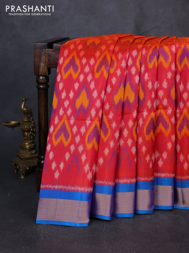 Ikat soft silk saree dual shade of pinkish orange and cs blue with allover ikat weaves and zari woven border
