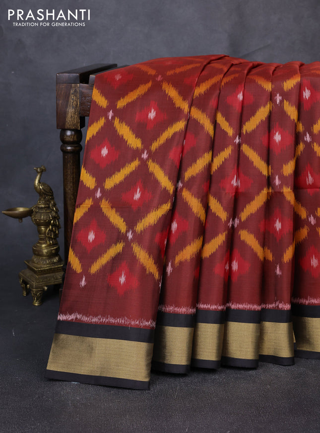 Ikat soft silk saree maroon and black with allover ikat weaves and zari woven border