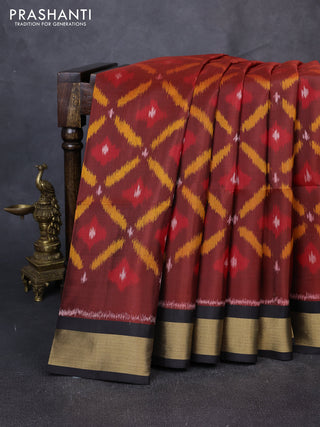Ikat soft silk saree maroon and black with allover ikat weaves and zari woven border