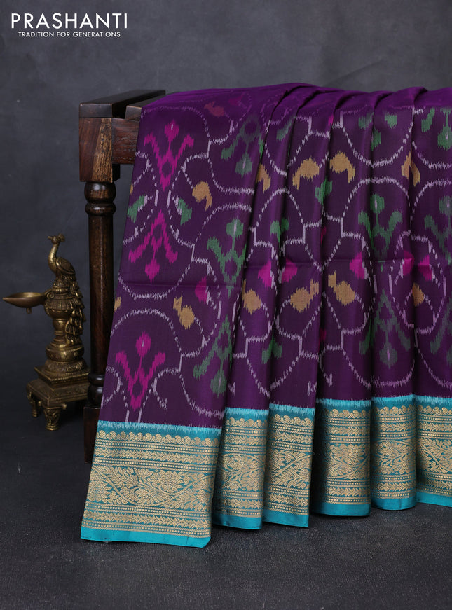 Ikat soft silk saree purple and teal green with allover ikat weaves and zari woven border