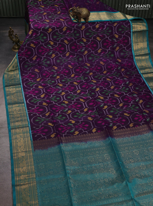 Ikat soft silk saree purple and teal green with allover ikat weaves and zari woven border