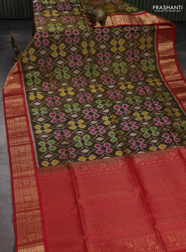 Ikat soft silk saree dark mehendi green and red with allover ikat weaves and zari woven border