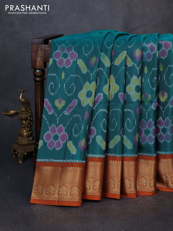 Ikat soft silk saree peacock green and rustic orange with allover ikat weaves and zari woven border