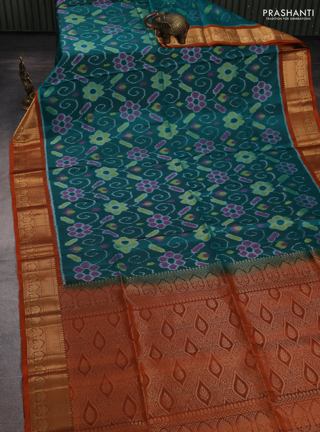 Ikat soft silk saree peacock green and rustic orange with allover ikat weaves and zari woven border