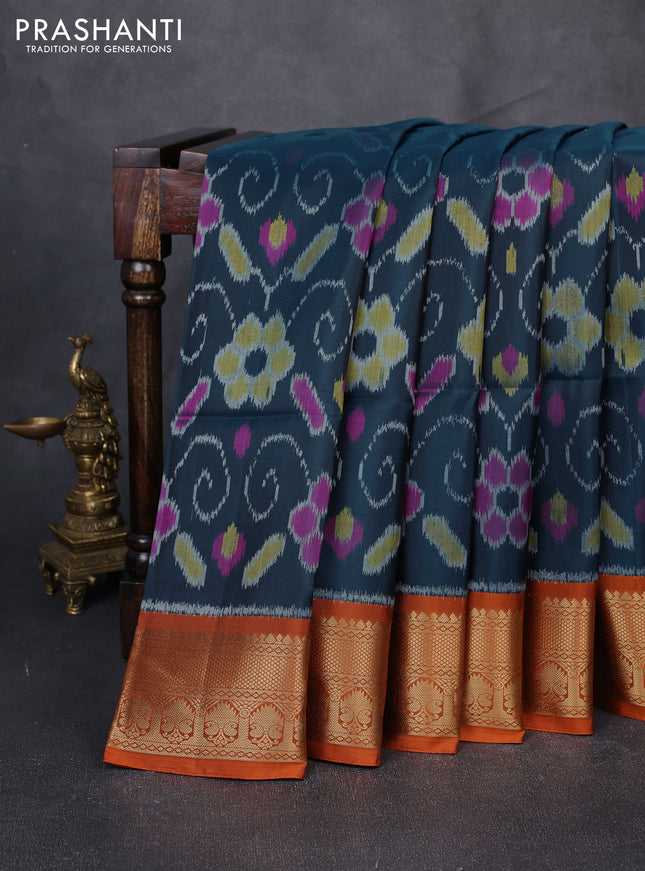 Ikat soft silk saree dark peacock blue and rustic orange with allover ikat weaves and zari woven border