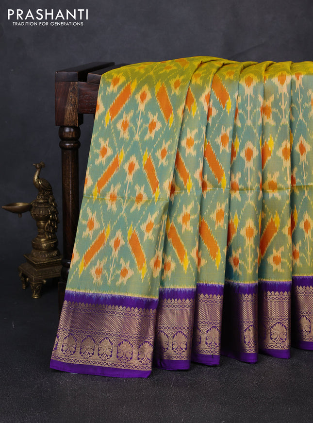Ikat soft silk saree dual shade of teal blue and violet with allover ikat weaves and zari woven border