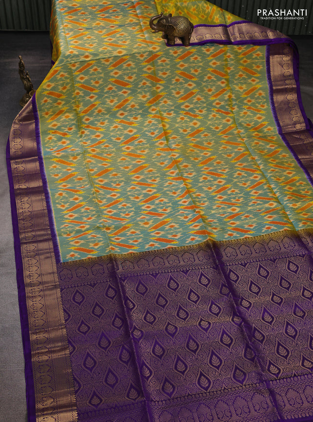 Ikat soft silk saree dual shade of teal blue and violet with allover ikat weaves and zari woven border