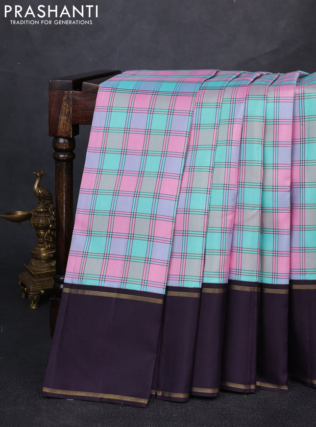 Pure kanchipuram silk saree milti colour and jamun shade with allover checked pattern and rettapet zari woven border