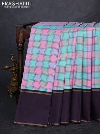 Pure kanchipuram silk saree milti colour and jamun shade with allover checked pattern and rettapet zari woven border