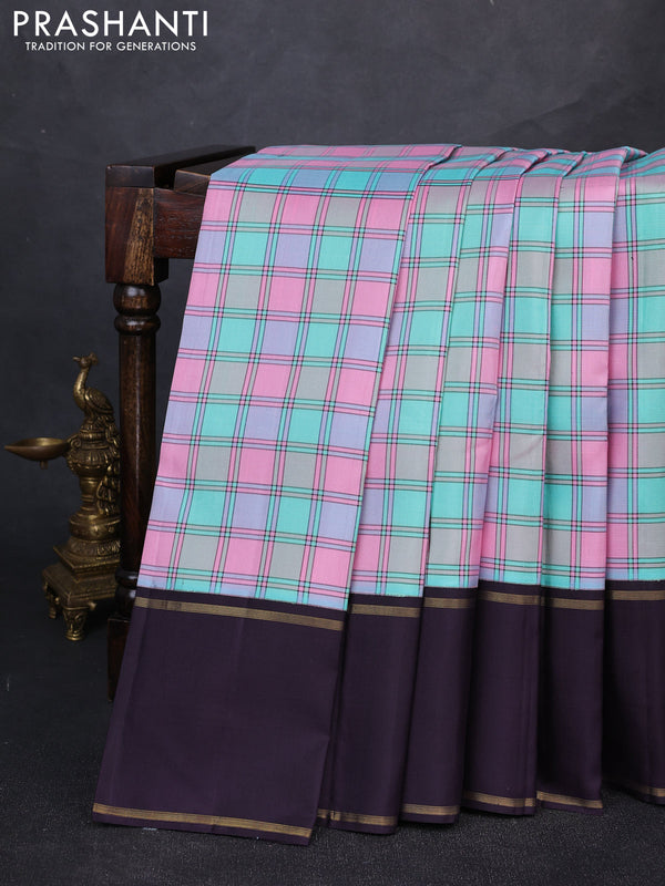 Pure kanchipuram silk saree milti colour and jamun shade with allover checked pattern and rettapet zari woven border