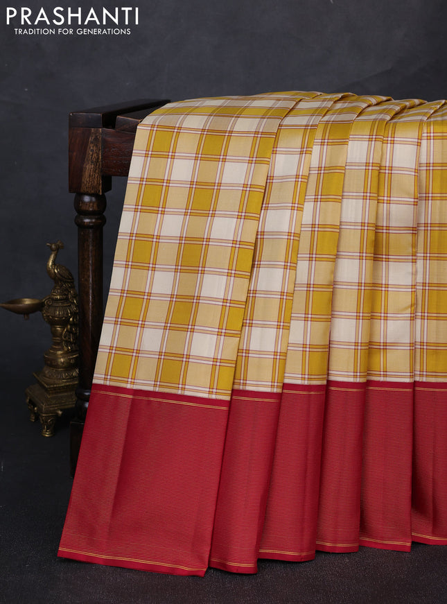 Pure kanchipuram silk saree cream mustard and maroon with allover checked pattern and long zari woven border