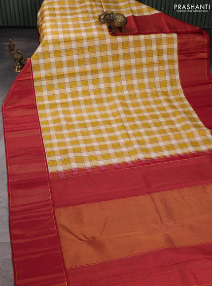 Pure kanchipuram silk saree cream mustard and maroon with allover checked pattern and long zari woven border
