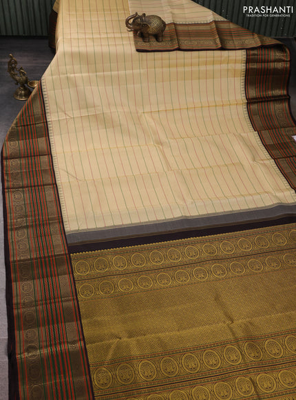 Pure kanchipuram silk saree cream and coffee brown with allover thread weaves and long thread woven border