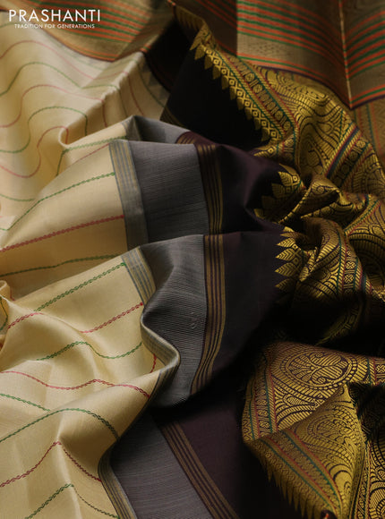 Pure kanchipuram silk saree cream and coffee brown with allover thread weaves and long thread woven border