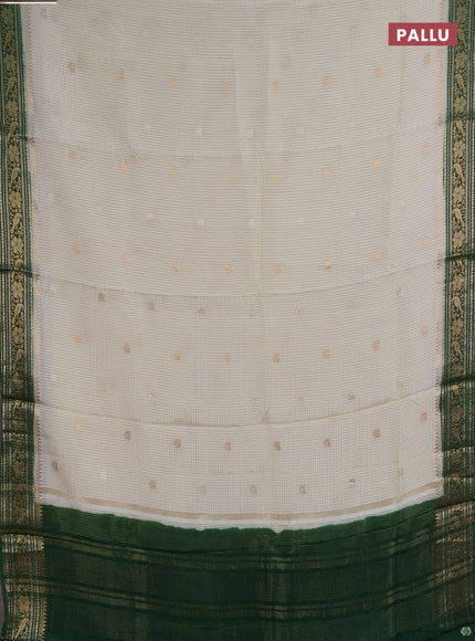 Semi mysore silk saree cream and green with allover zari checks & buttas and zari woven border