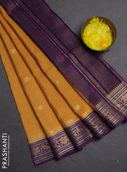 Semi mysore silk saree dark mustard and violet with allover zari checks & buttas and zari woven border