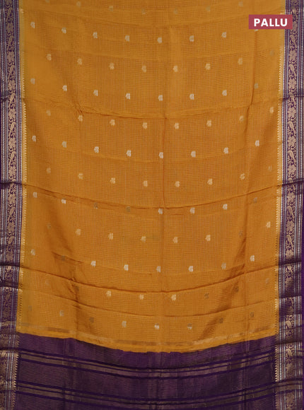 Semi mysore silk saree dark mustard and violet with allover zari checks & buttas and zari woven border