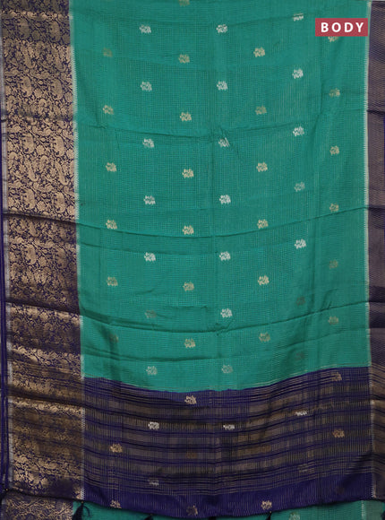 Semi mysore silk saree teal green and blue with allover zari checks & buttas and long zari woven border