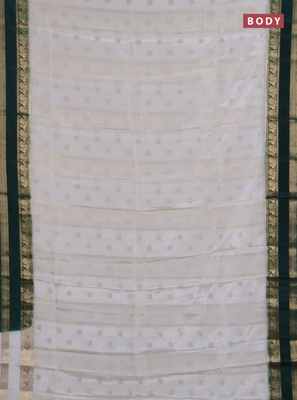 Semi mysore silk saree off white and bottle green with allover zari checks & buttas and rettapet zari woven border