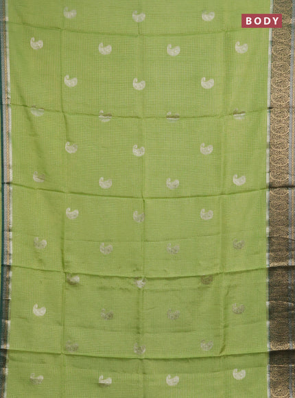 Semi mysore silk saree pista green and green with allover zari checks & buttas and zari woven border