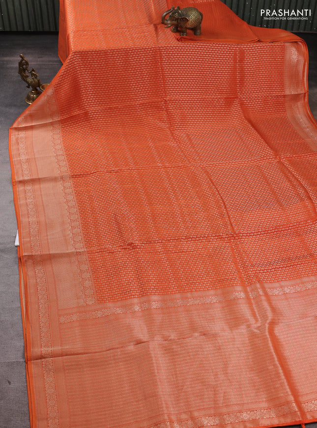 Banarasi silk saree rust shade with allover thread & zari woven buttas and long zari woven border