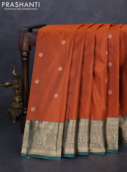 Bangalori silk saree rust shade and green with allover zari woven buttas and zari woven border