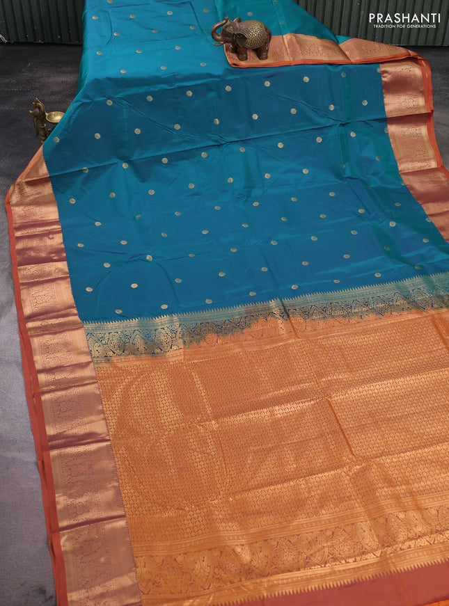 Bangalori silk saree teal green and rust shade with allover zari woven buttas and zari woven border