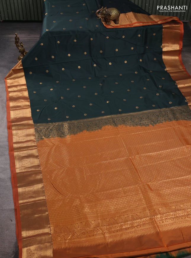 Bangalori silk saree bottle green and rust shade with allover zari woven buttas and zari woven border