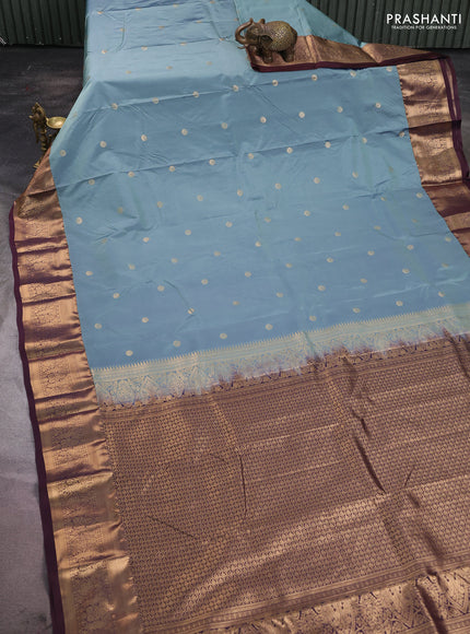 Bangalori silk saree pastel blue and coffee brown with allover zari woven buttas and zari woven border