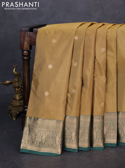 Bangalori silk saree dark mustard and bottle green with allover zari woven buttas and zari woven border