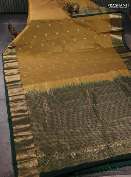 Bangalori silk saree dark mustard and bottle green with allover zari woven buttas and zari woven border