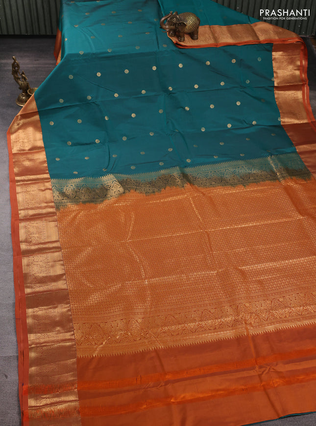 Bangalori silk saree teal green and rust shade with allover zari woven buttas and zari woven border