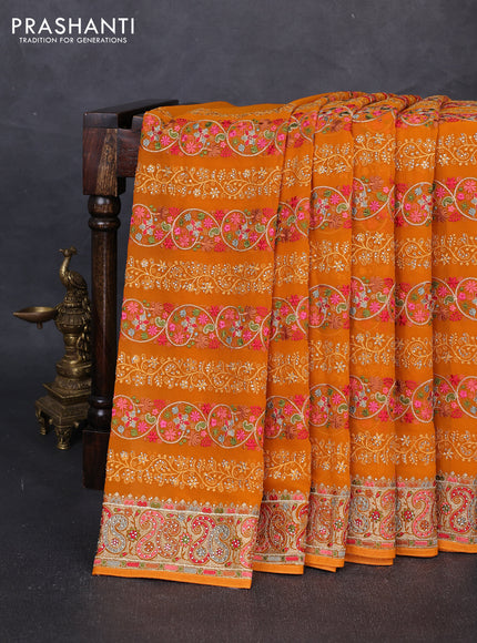 Georgette saree orange with allover embroidery & stone work