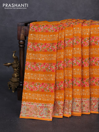 Georgette saree orange with allover embroidery & stone work