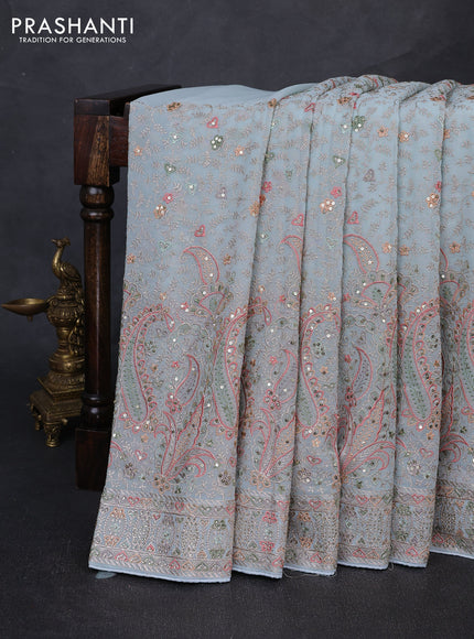 Georgette saree pastel blue with allover embroidery & sequin work and embroidery stone work border