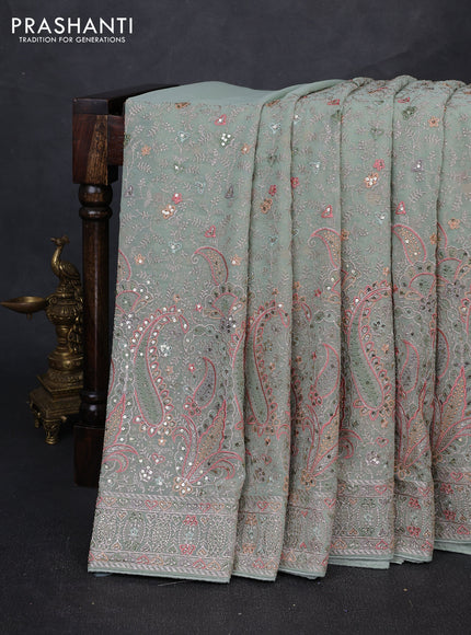 Georgette saree pastel green with allover embroidery & sequin work and embroidery stone work border