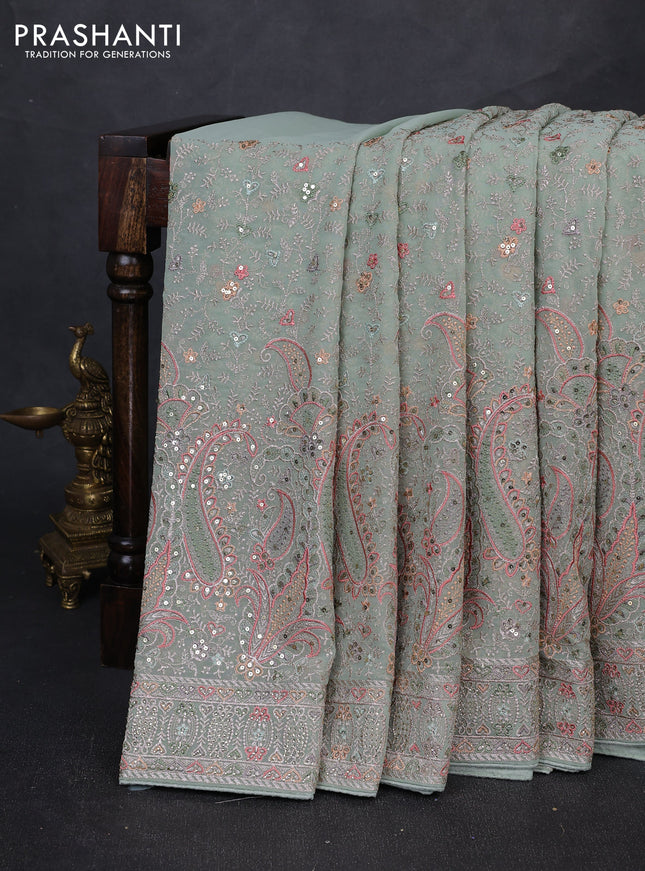 Georgette saree pastel green with allover embroidery & sequin work and embroidery stone work border