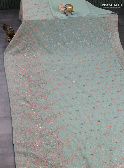 Georgette saree pastel green with allover embroidery & sequin work and embroidery stone work border