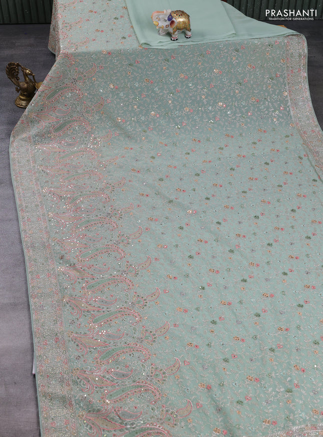 Georgette saree pastel green with allover embroidery & sequin work and embroidery stone work border