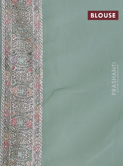 Georgette saree pastel green with allover embroidery & sequin work and embroidery stone work border