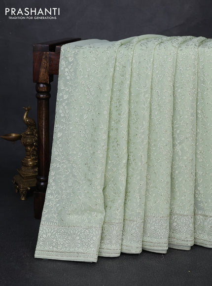 Georgette saree pista green with allover embroidery & stone work