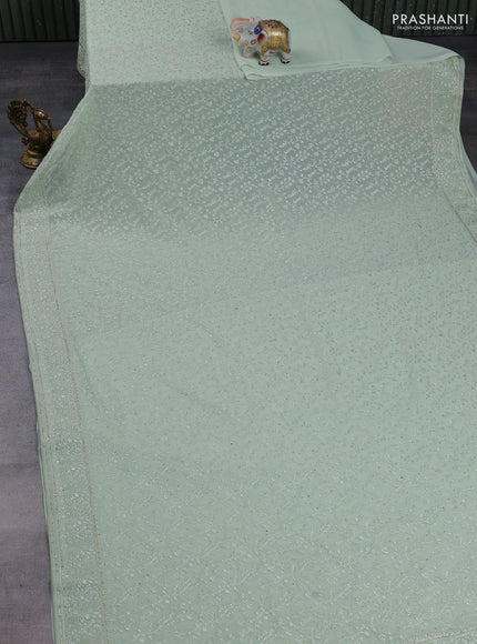Georgette saree pista green with allover embroidery & stone work