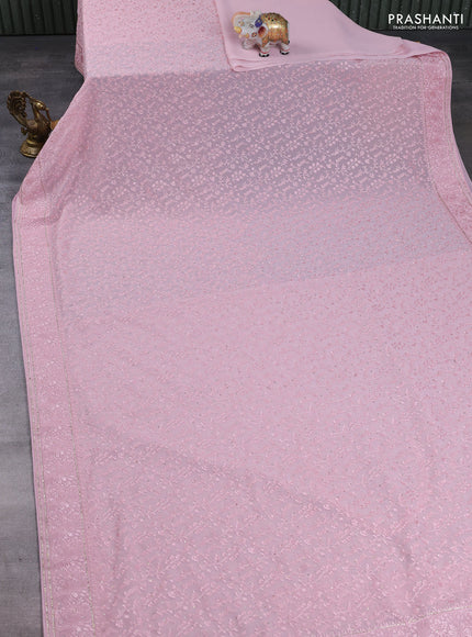 Georgette saree light pink with allover embroidery & stone work