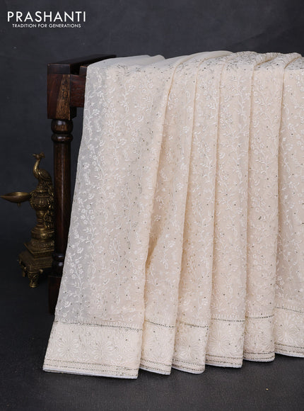 Georgette saree cream with allover embroidery & stone work