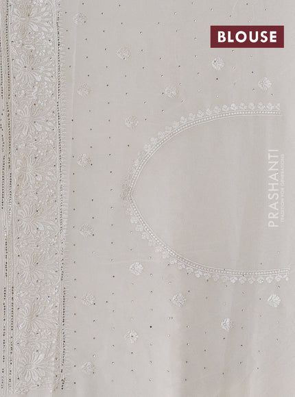 Georgette saree cream with allover embroidery & stone work