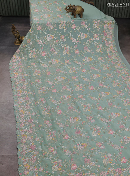 Georgette saree pastel green with allover embroidery & stone work