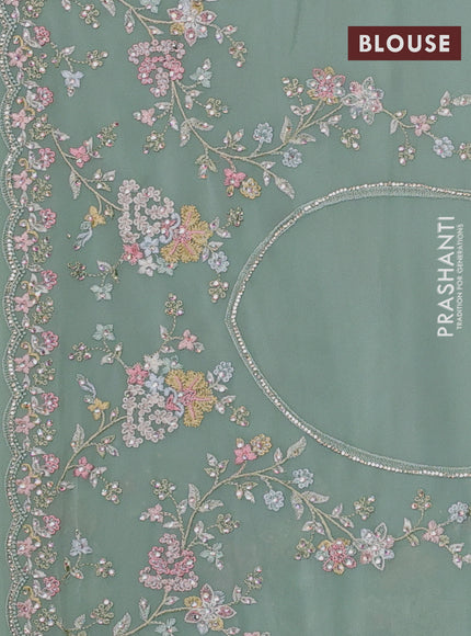 Georgette saree pastel green with allover embroidery & stone work