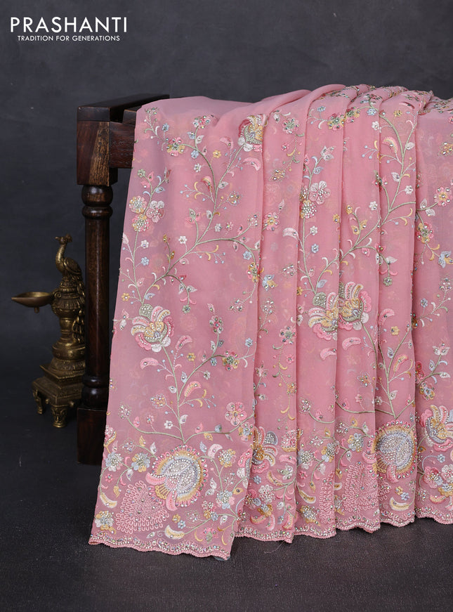 Georgette saree peach pink with allover embroidery & stone work