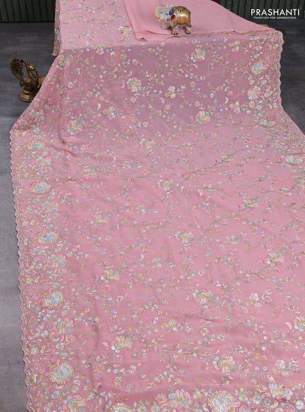 Georgette saree peach pink with allover embroidery & stone work