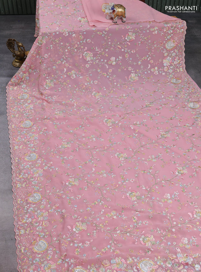 Georgette saree peach pink with allover embroidery & stone work